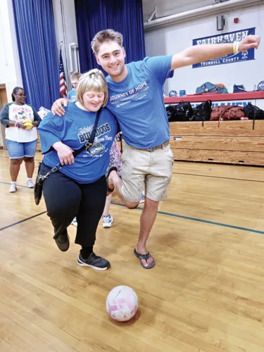 Cross-country cyclists spend day with Fairhaven students